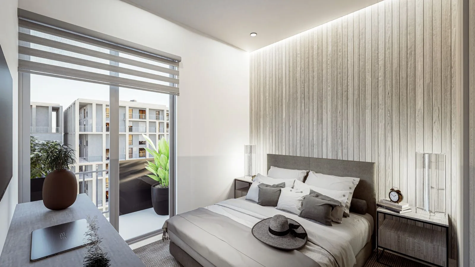Recámara principal con balcón privado, vista al desarrollo.